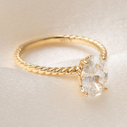 Solitaire & Twisted Shank-1.5 CT Oval Lab Grown Diamond Engagement Ring