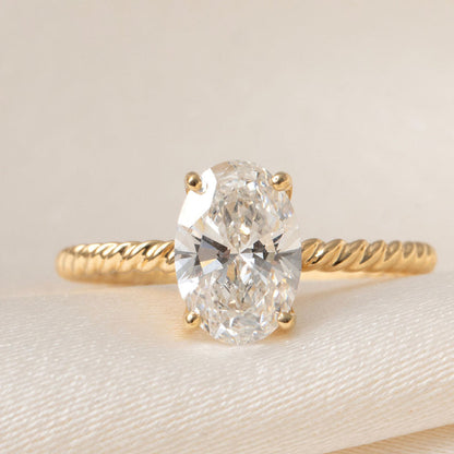 Solitaire & Twisted Shank-1.5 CT Oval Lab Grown Diamond Engagement Ring