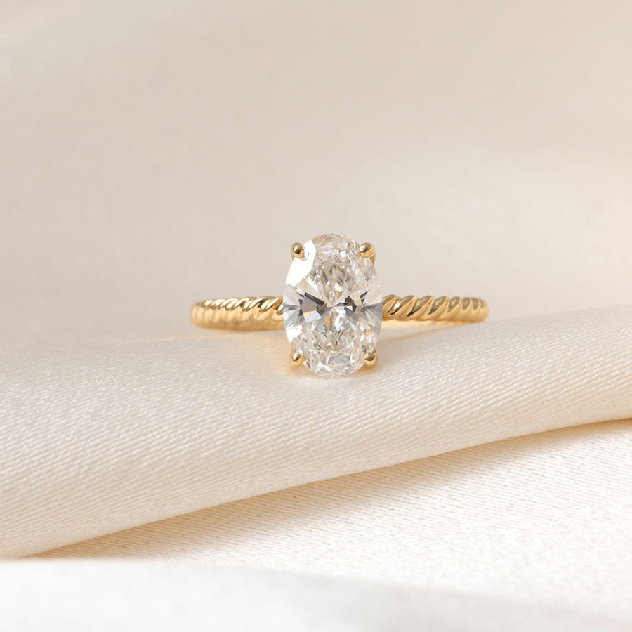 Solitaire & Twisted Shank-1.5 CT Oval Lab Grown Diamond Engagement Ring
