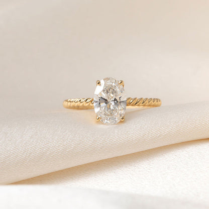Solitaire & Twisted Shank-1.5 CT Oval Lab Grown Diamond Engagement Ring