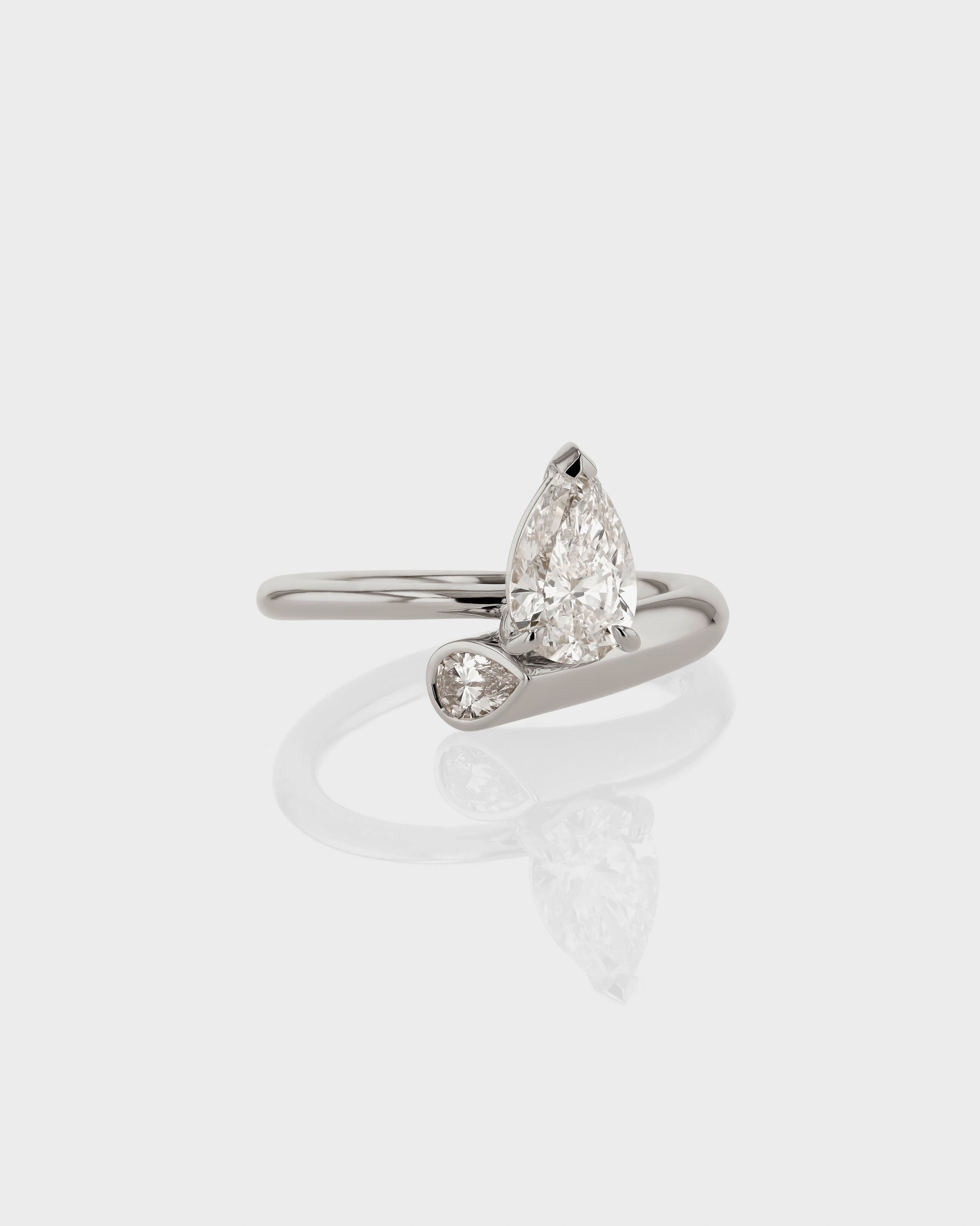 1.01 CT Pear Lab Grown Diamond Swirl Engagement Ring - Elegant Twist Design