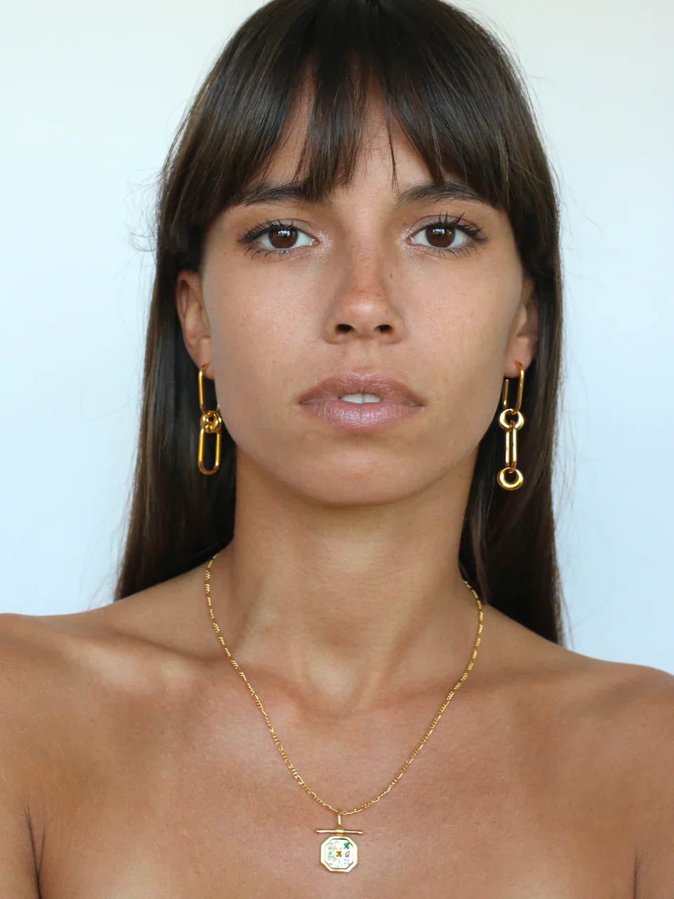 Golden Link Elegance: Elongated Statement Earrings