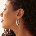 Load image into Gallery viewer, Sleek Silver Teardrop Hoop Earrings
