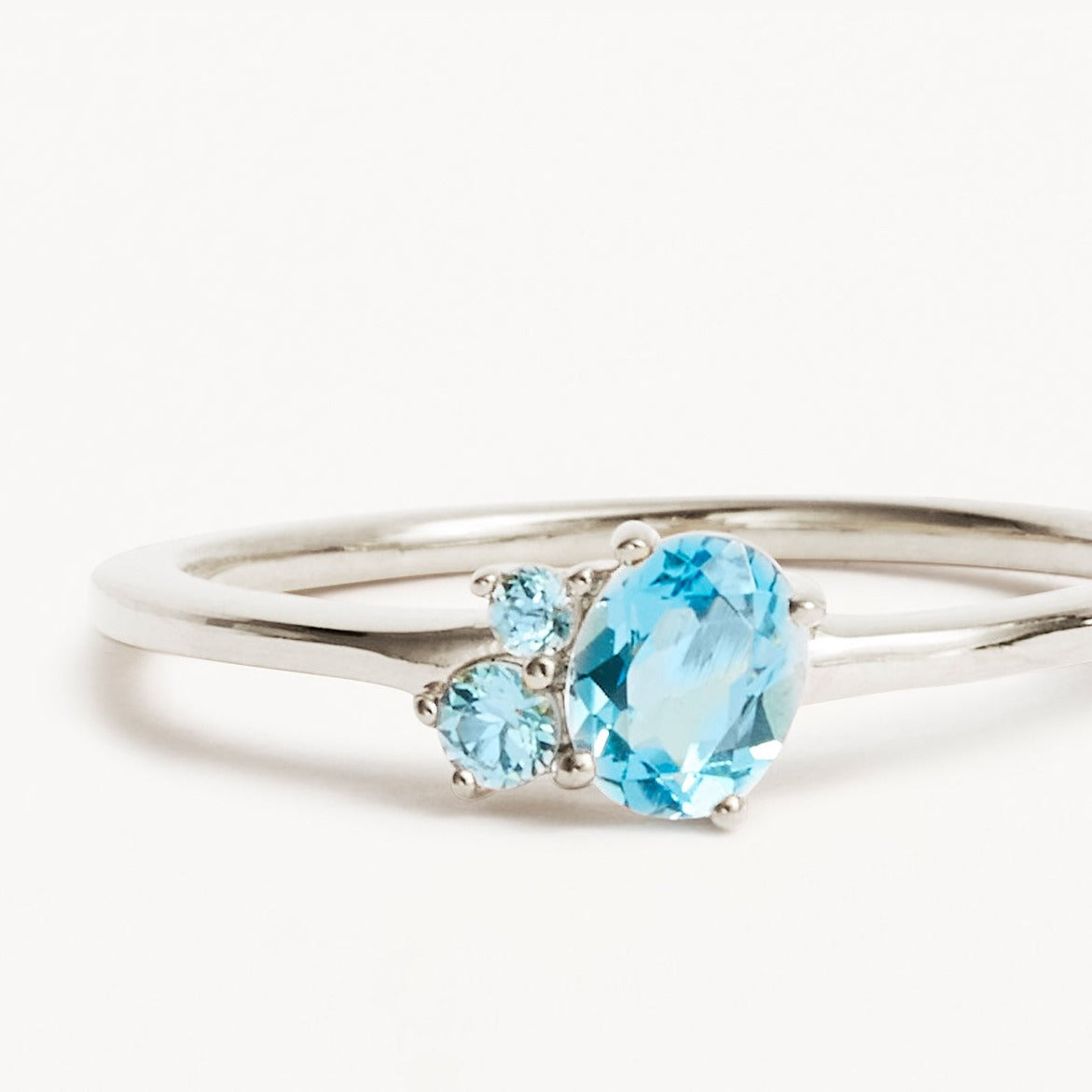 0.50 CT Oval Blue Topaz Three Stone Gemstone Engagement Ring