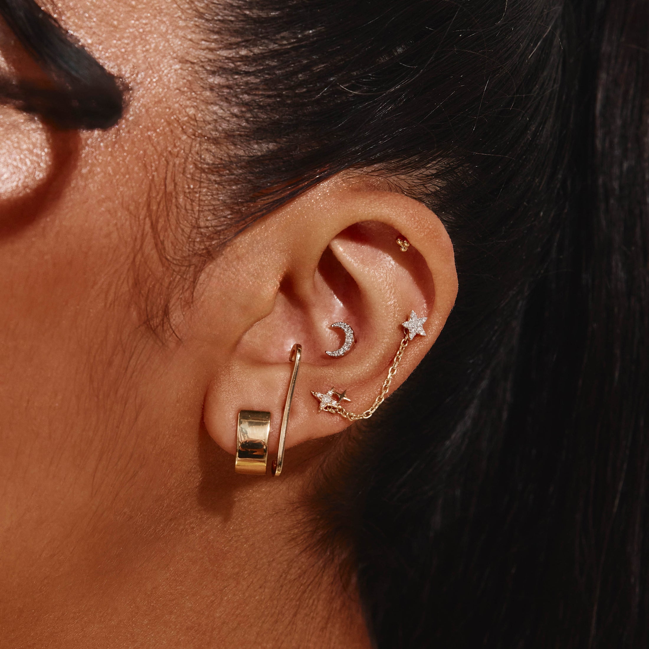 Sleek U-Shaped Gold Huggie Earrings