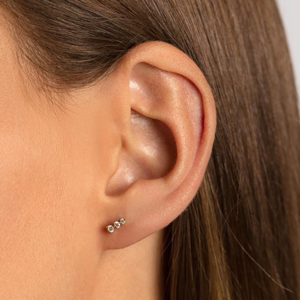 Radiant Elegance: 0.10 TCW Round Lab Grown Diamond Trio Stud Earrings 5