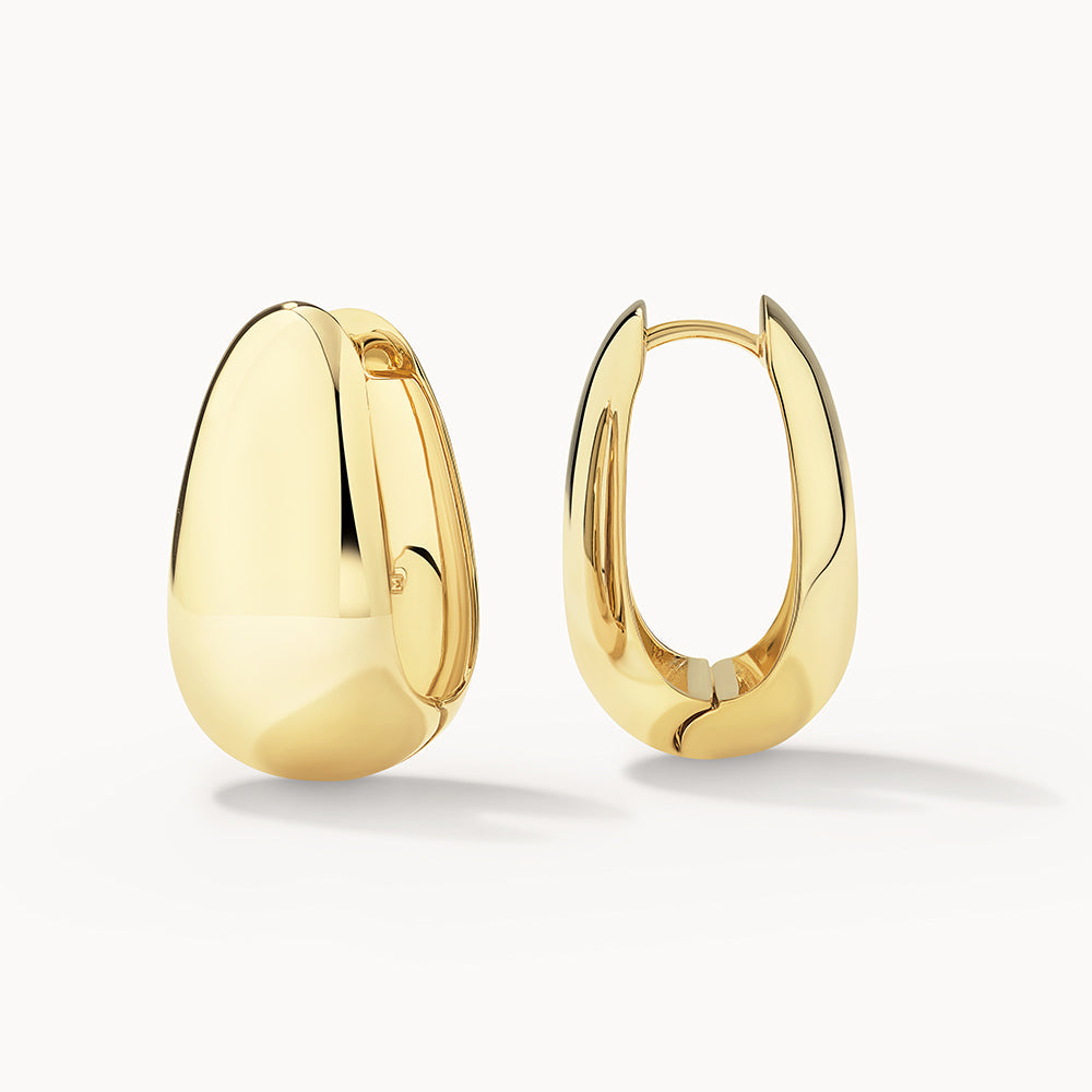 Golden Elegance: Bold Dome Hoop Earrings 1
