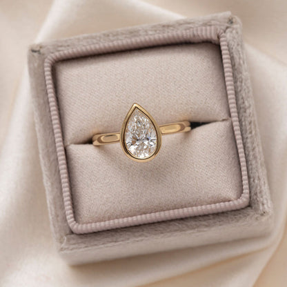 Solitare & Bezel-1.5 CT Pear Lab Grown Diamond Engagement Ring