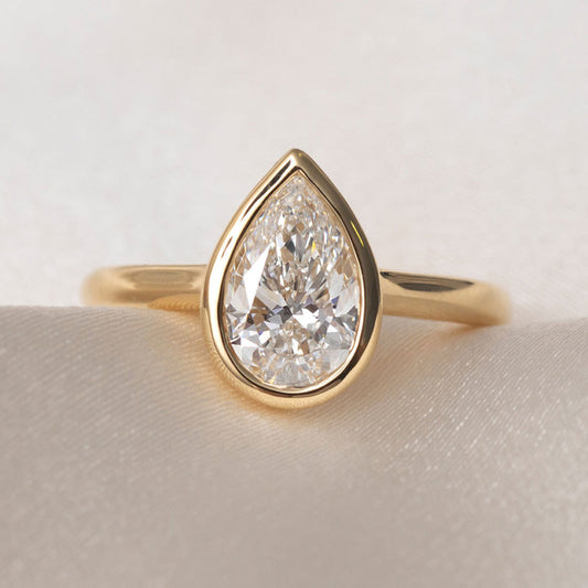 Solitare & Bezel-1.5 CT Pear Lab Grown Diamond Engagement Ring