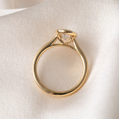 Solitare & Bezel-1.5 CT Pear Lab Grown Diamond Engagement Ring