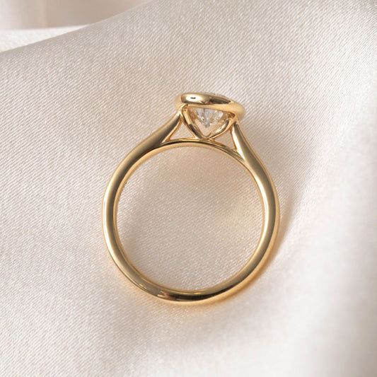Solitare & Bezel-1.5 CT Pear Lab Grown Diamond Engagement Ring