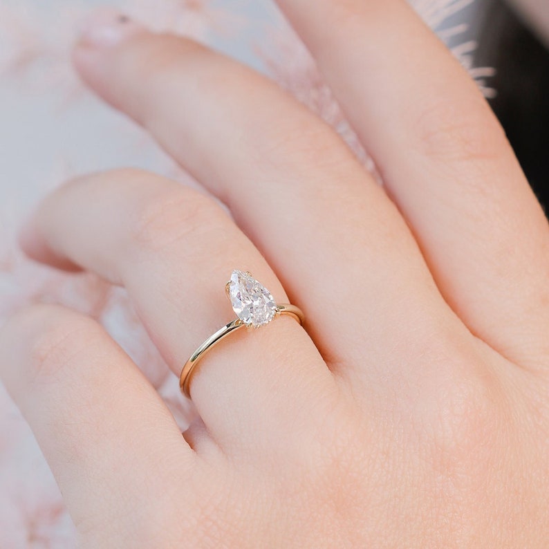 1.05 CT Pear-Shaped Lab-Grown Diamond Hidden Halo Engagement Ring