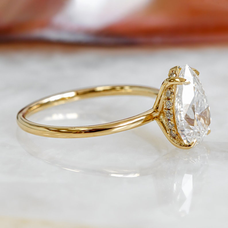 1.05 CT Pear-Shaped Lab-Grown Diamond Hidden Halo Engagement Ring