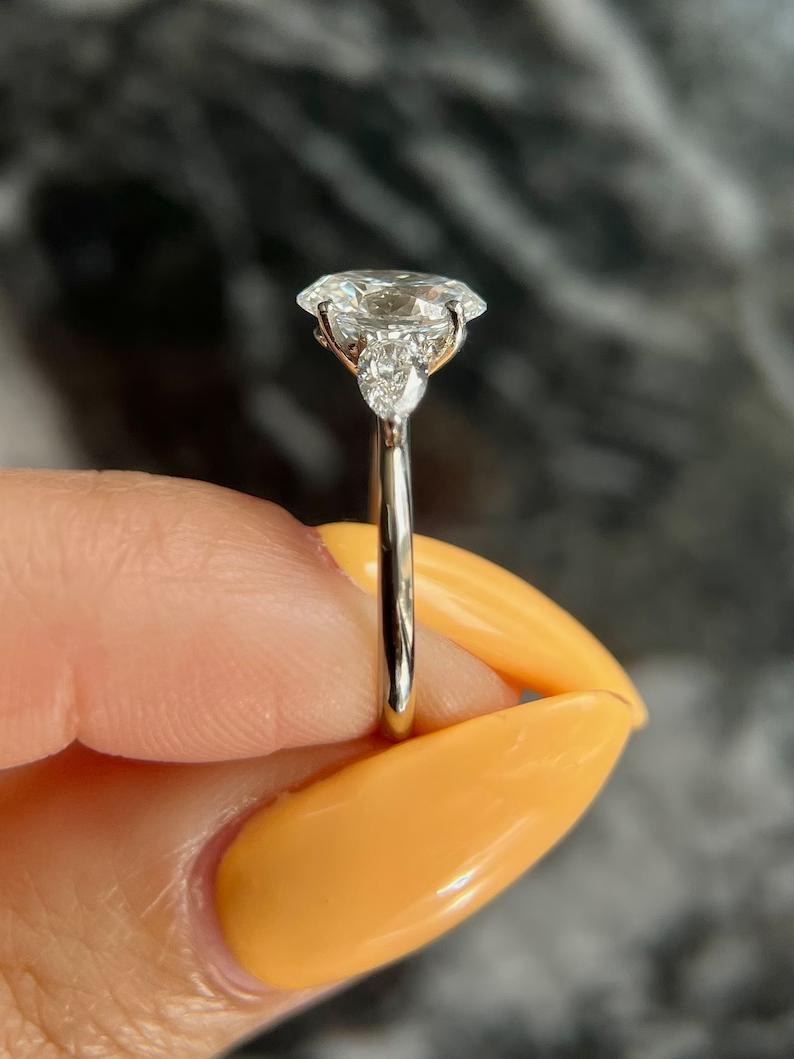 1.5 CT Oval Lab-Grown Diamond Trio Elegance Engagement Ring 5