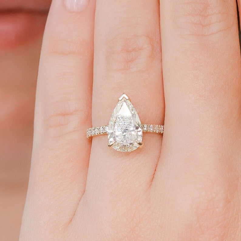 3.28 CT Pear Lab-Grown Diamond Hidden Halo Pave Engagement Ring