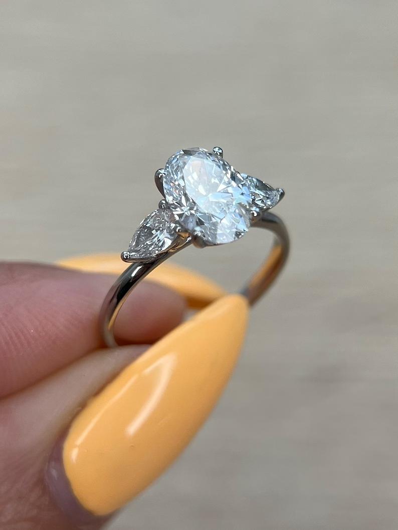 1.5 CT Oval Lab-Grown Diamond Trio Elegance Engagement Ring 3