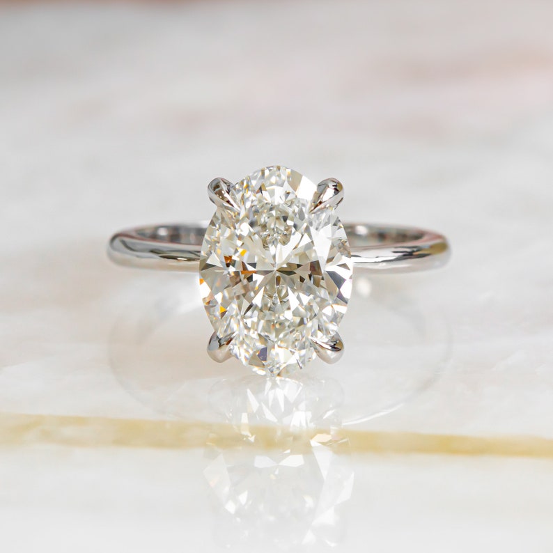 3.05 CT Oval Lab-Grown Diamond Hidden Halo Engagement Ring