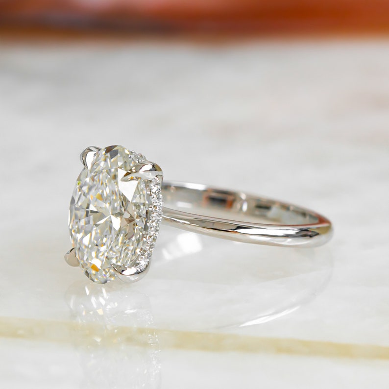 3.05 CT Oval Lab-Grown Diamond Hidden Halo Engagement Ring