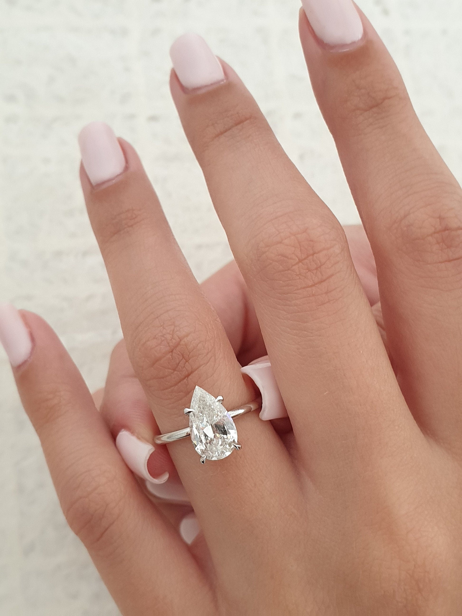 1.7 CT Pear Lab-Grown Diamond Hidden Halo Elegance Ring 3