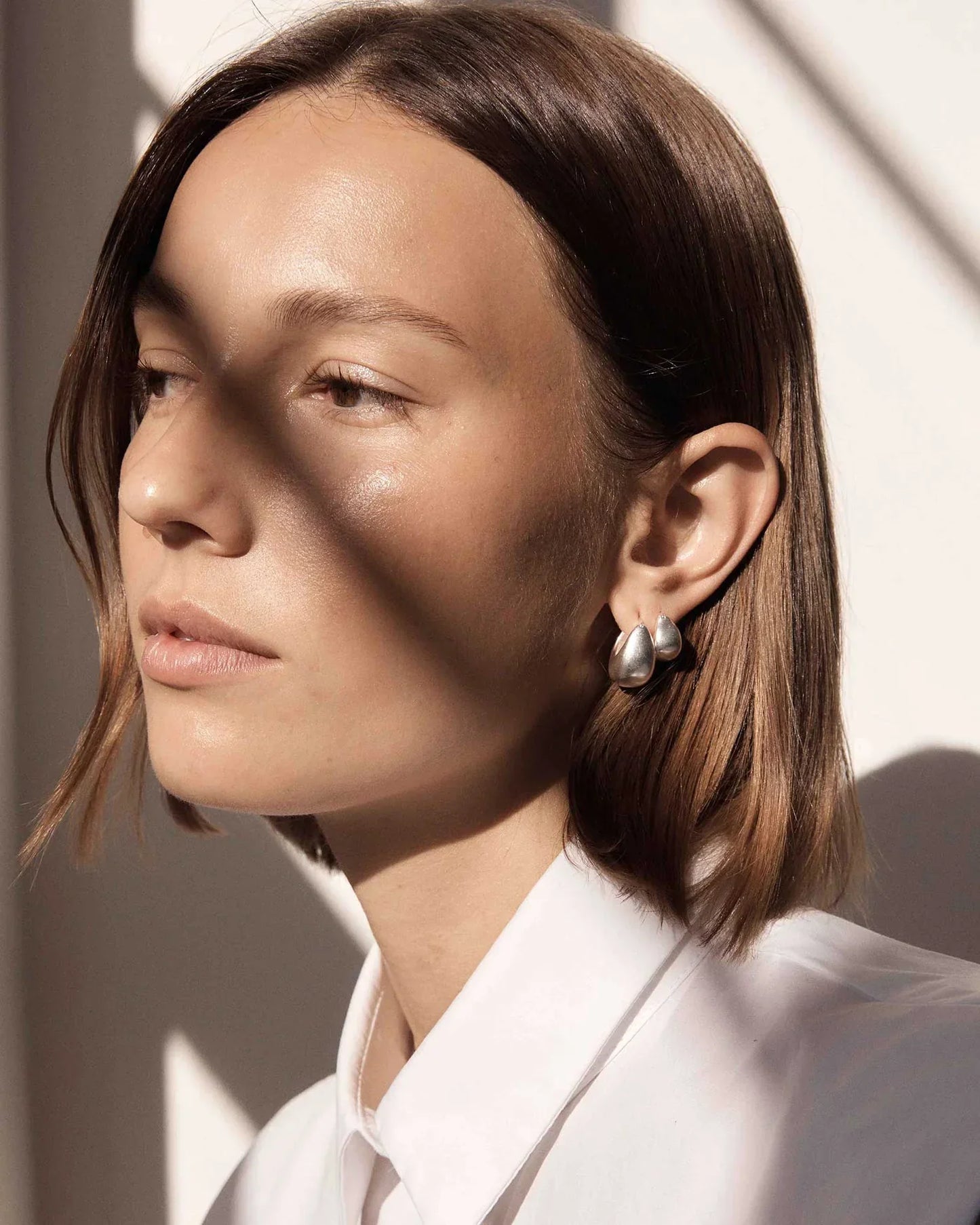 Stylish Sculpted Silver Medium Hoops 3