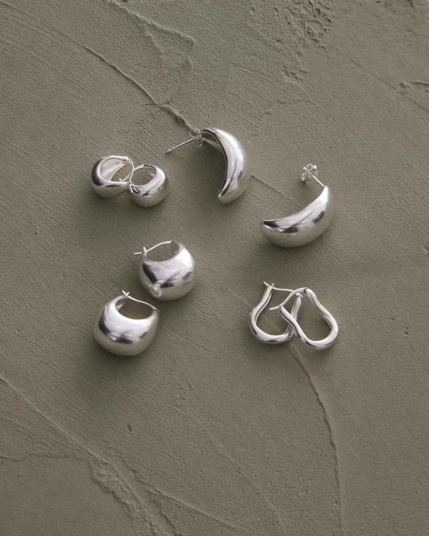 Stylish Sculpted Silver Medium Hoops 6