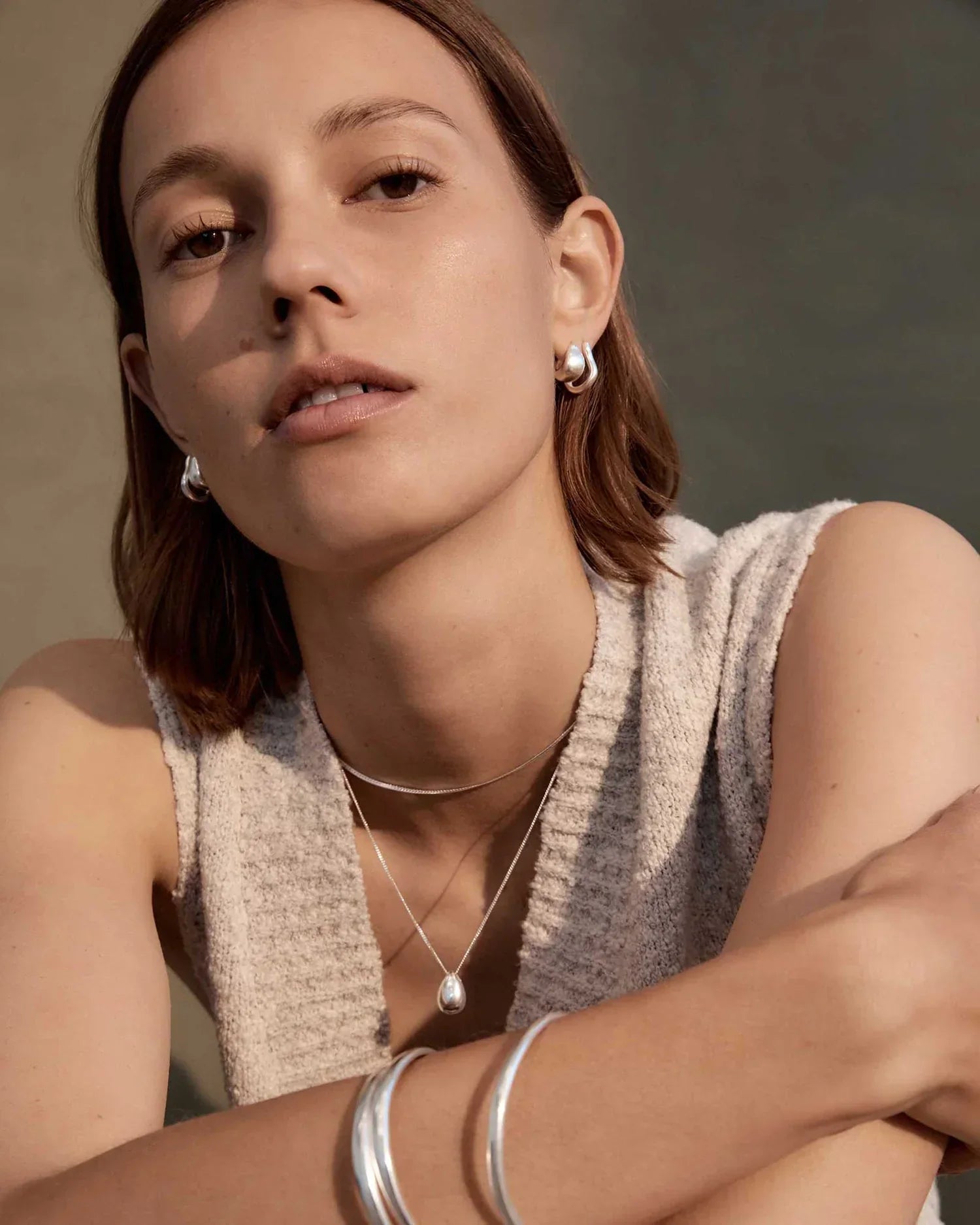 Elegant Sculpted Silver Hoops 4