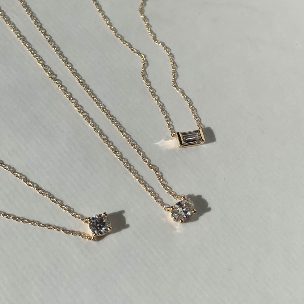 Emerald-Cut 0.20 TCW Lab Grown Diamond Solitaire Necklaces 9