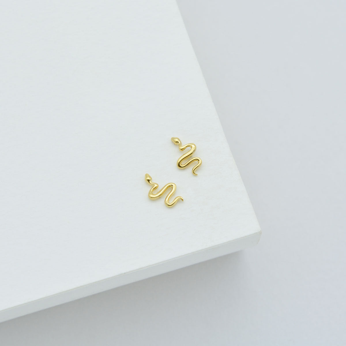 Golden Serpent Twist Stud Earrings