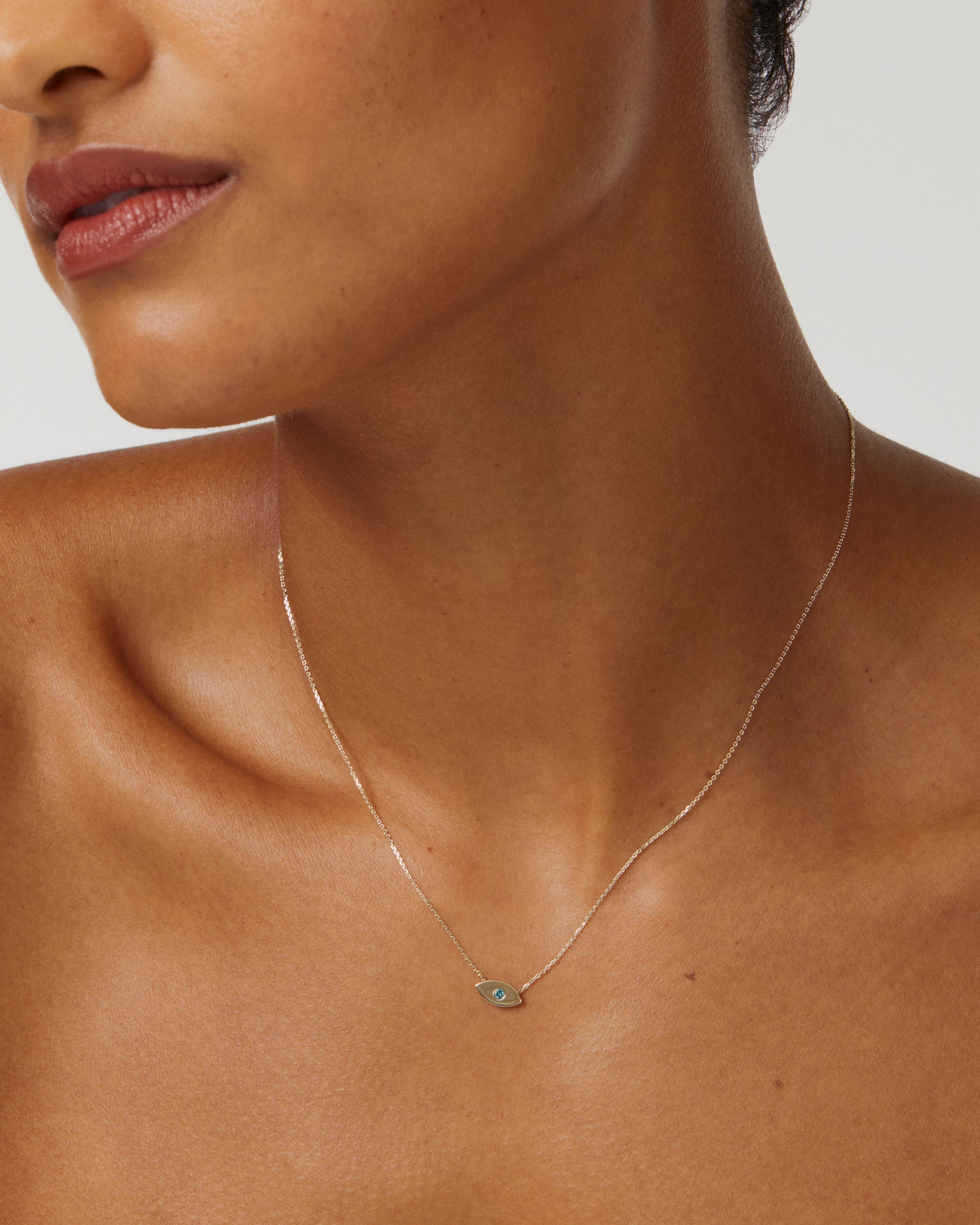 0.05 TCW Blue Topaz Lab-Created Diamond Evil Eye Pendant Necklace 3