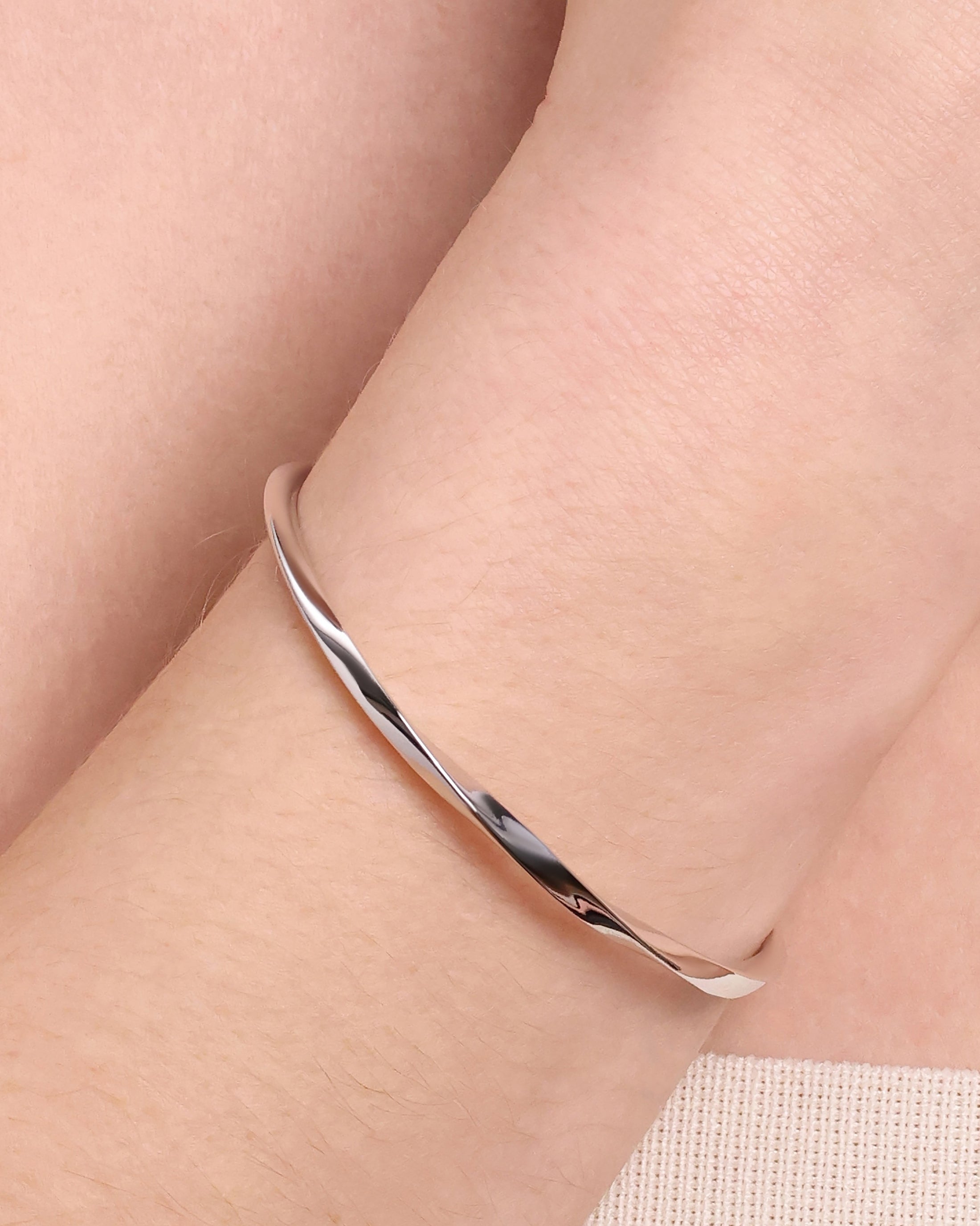 Elegant Twist Sterling Silver Bangle Bracelet