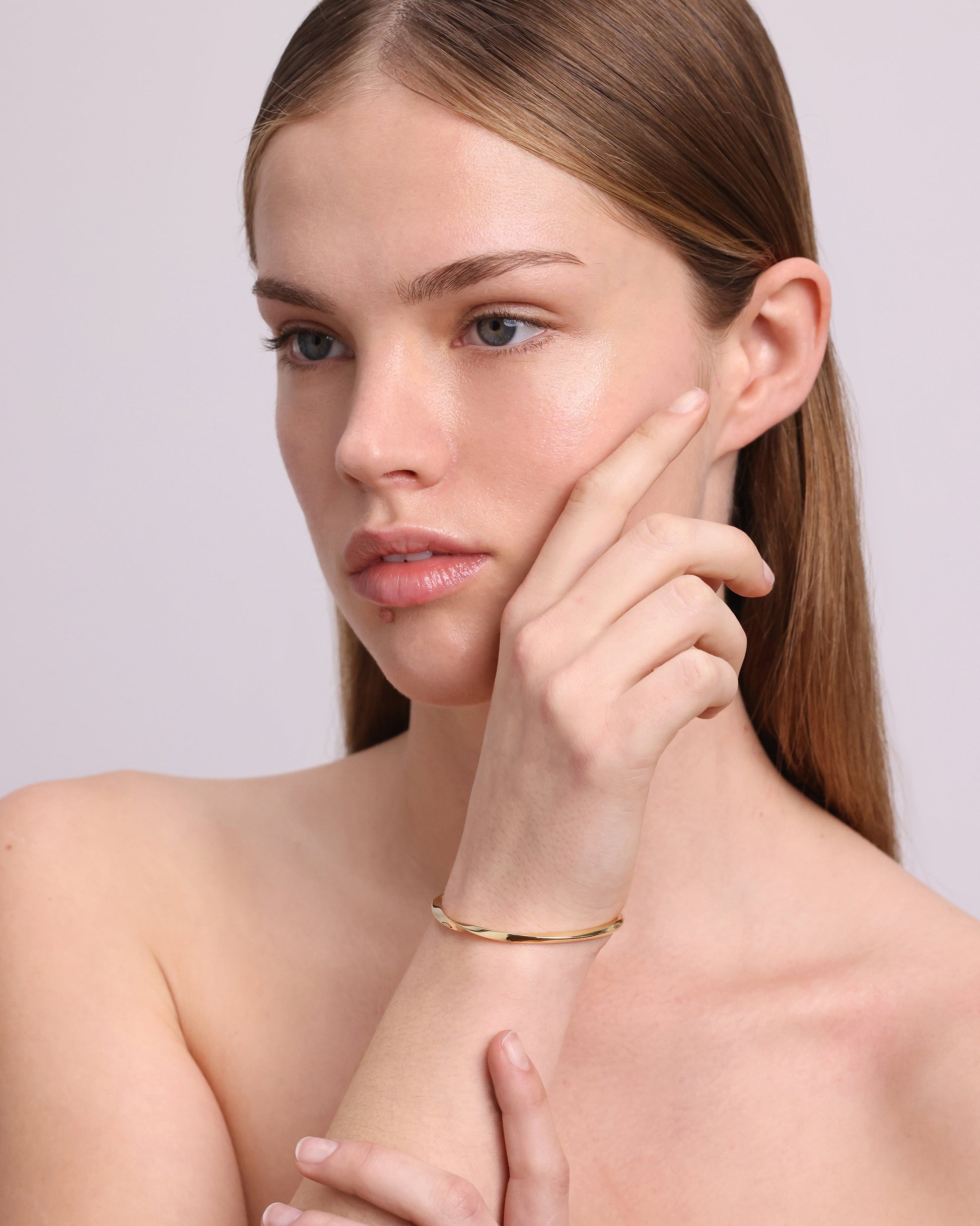 Golden Twisted Elegance Bangle Bracelet 2