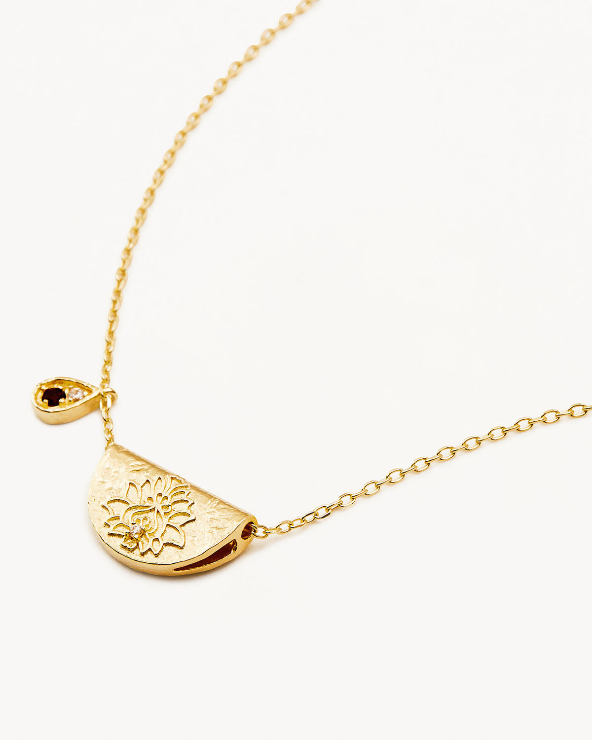 Elegant Gold Sunflower Necklace with Teardrop Garnet Accent 1