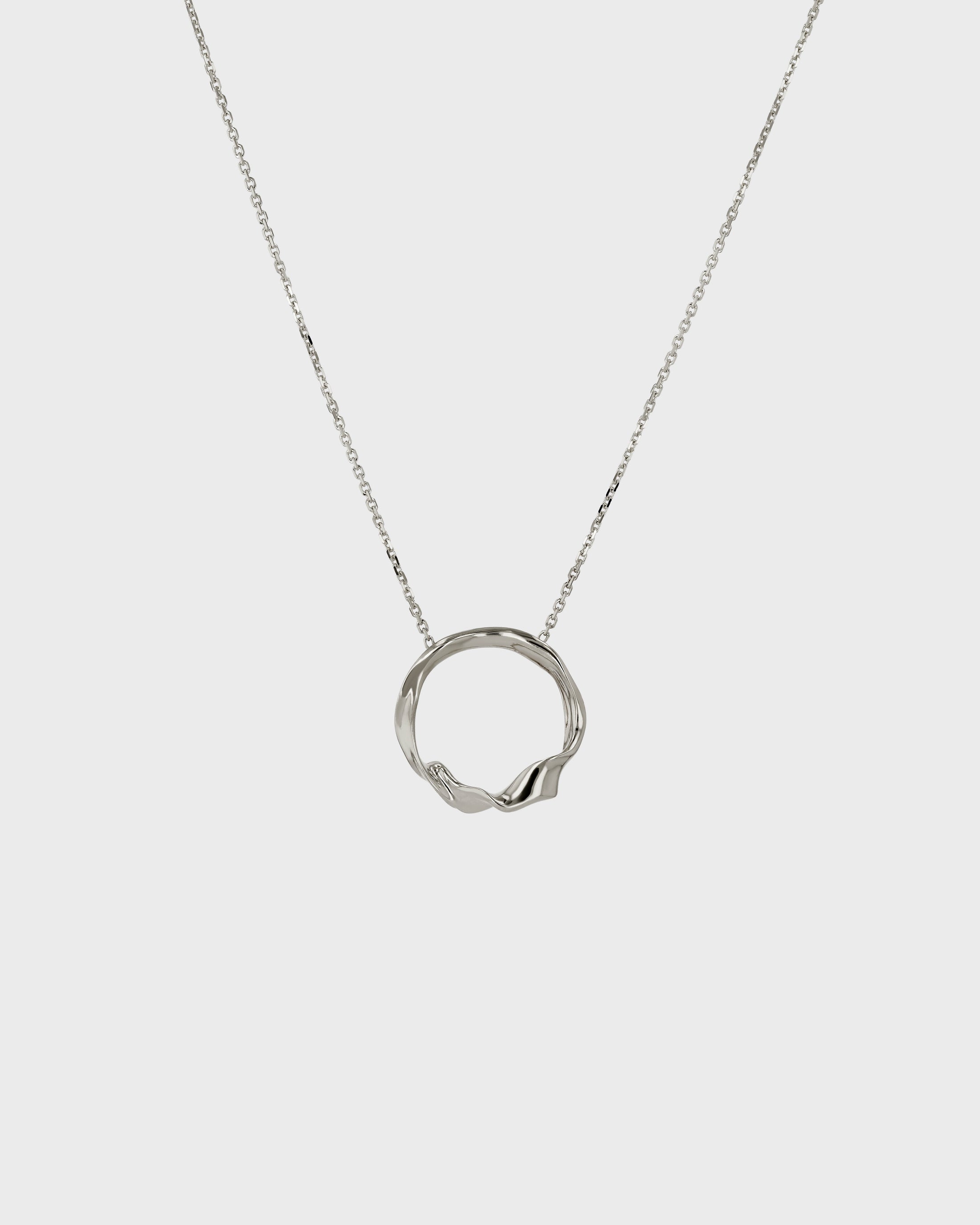 Elegant Silver Ripple Circle Pendant Necklace