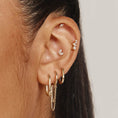 Load image into Gallery viewer, Gold Oval Paperclip Huggie Earrings
