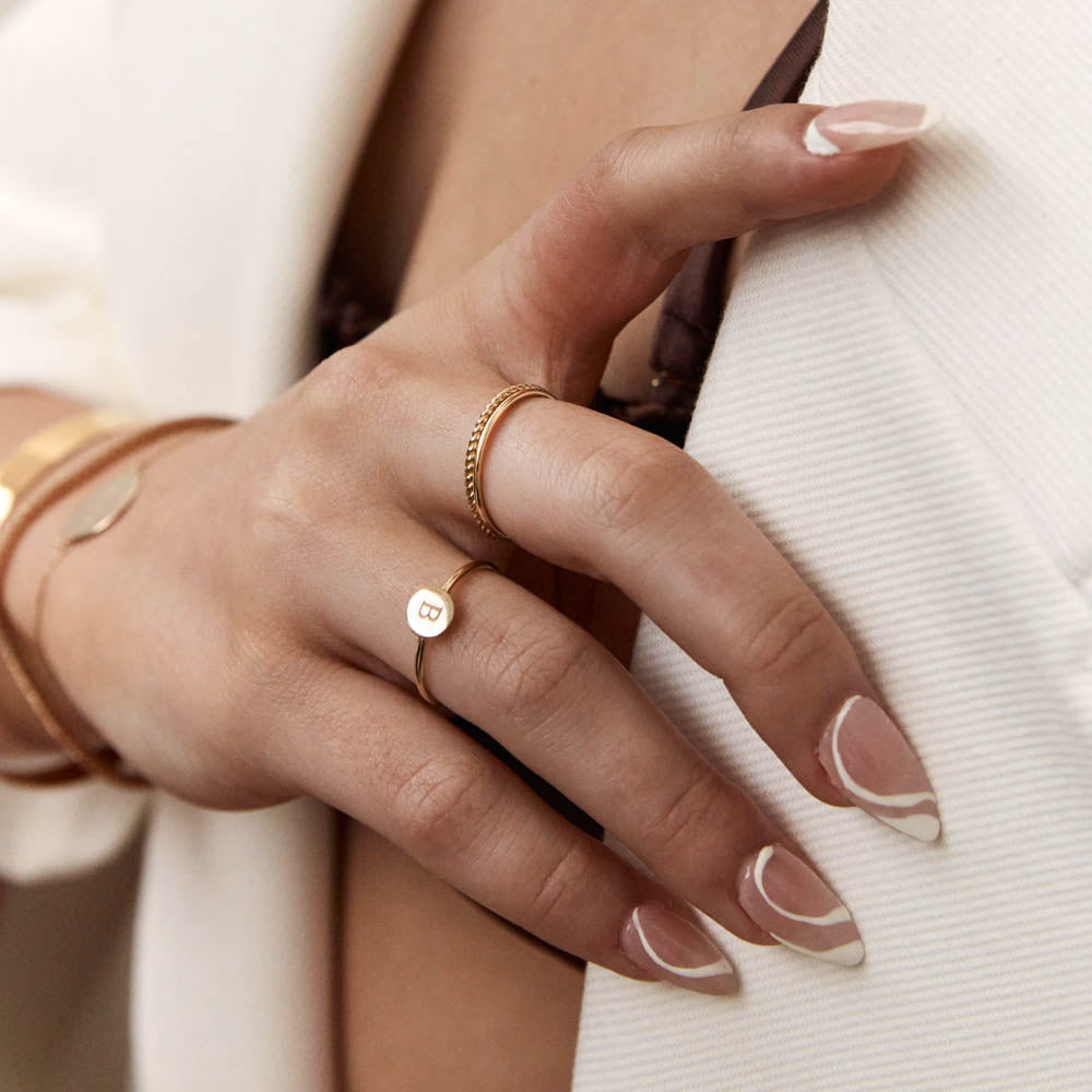 Twisted Elegance: Classic Gold Rope Band 9