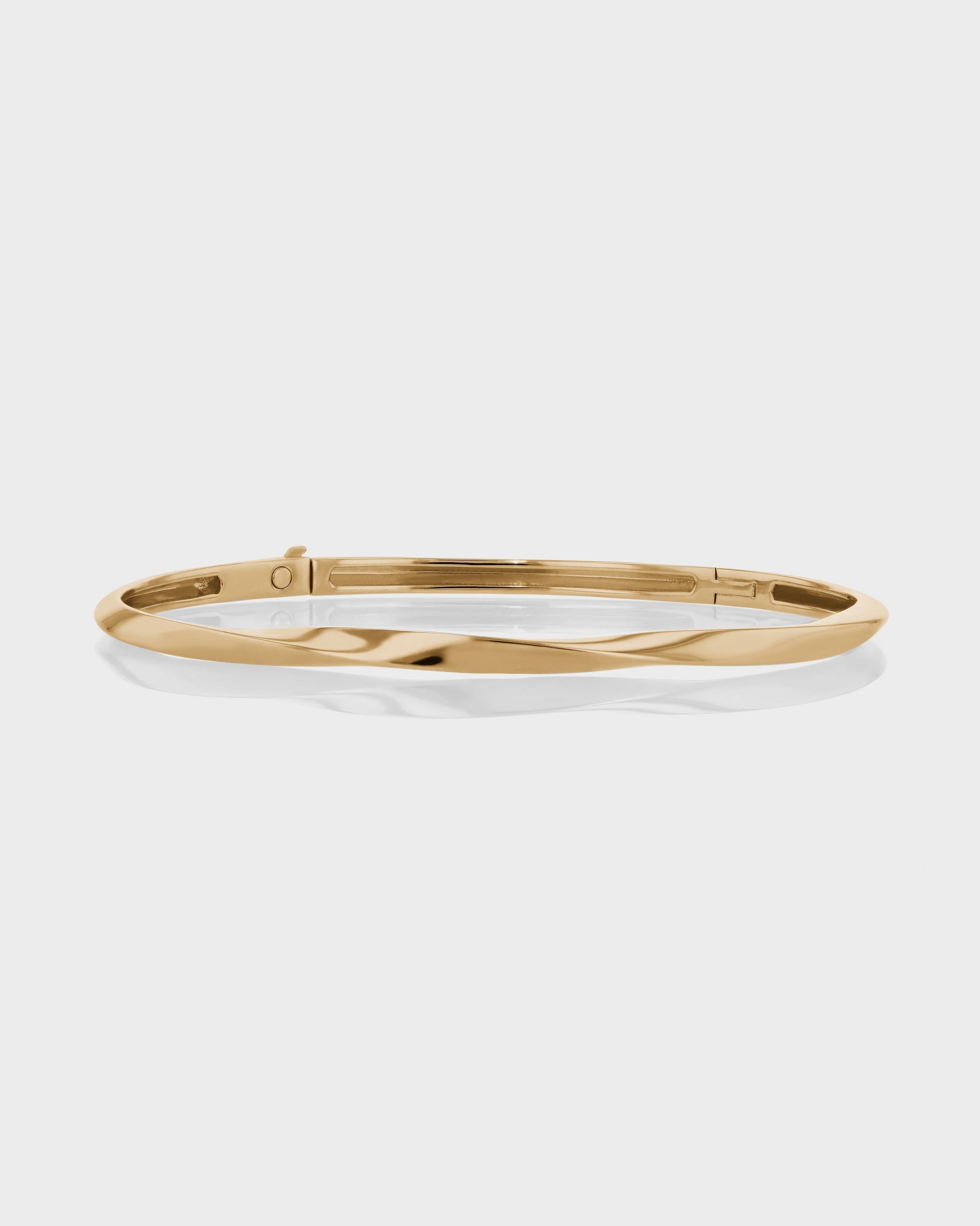Golden Twisted Elegance Bangle Bracelet 1