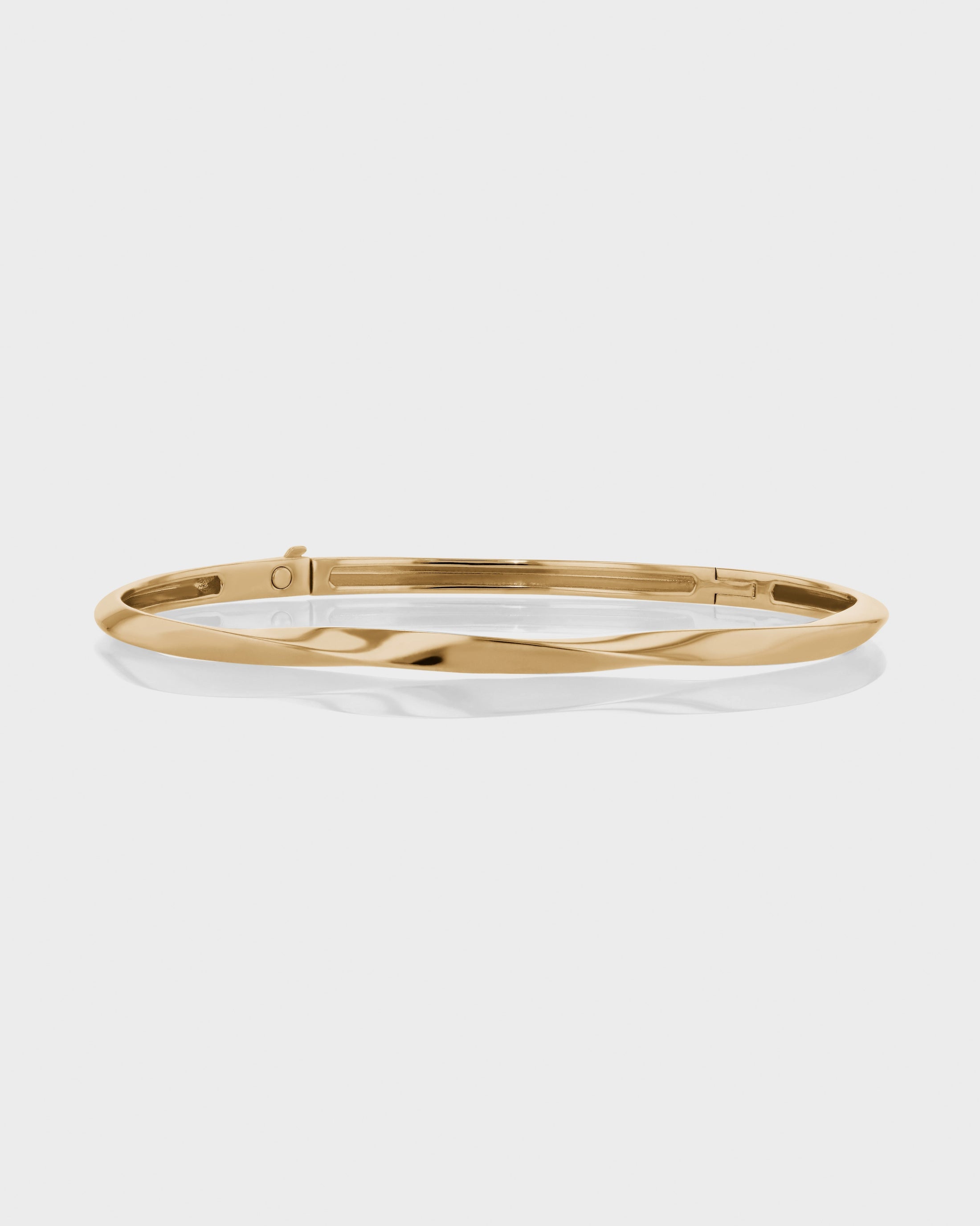 Golden Twisted Elegance Bangle Bracelet