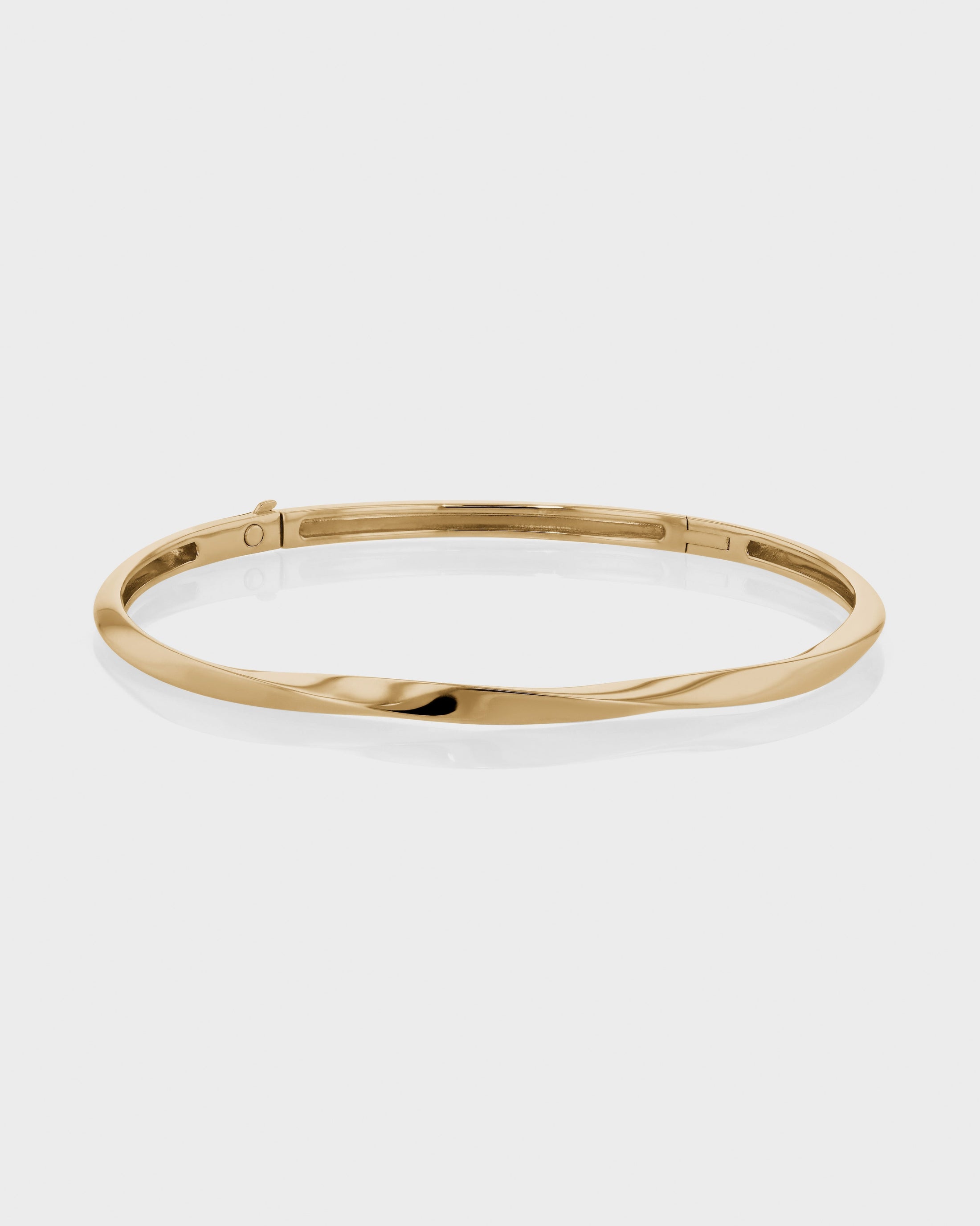 Golden Twisted Elegance Bangle Bracelet