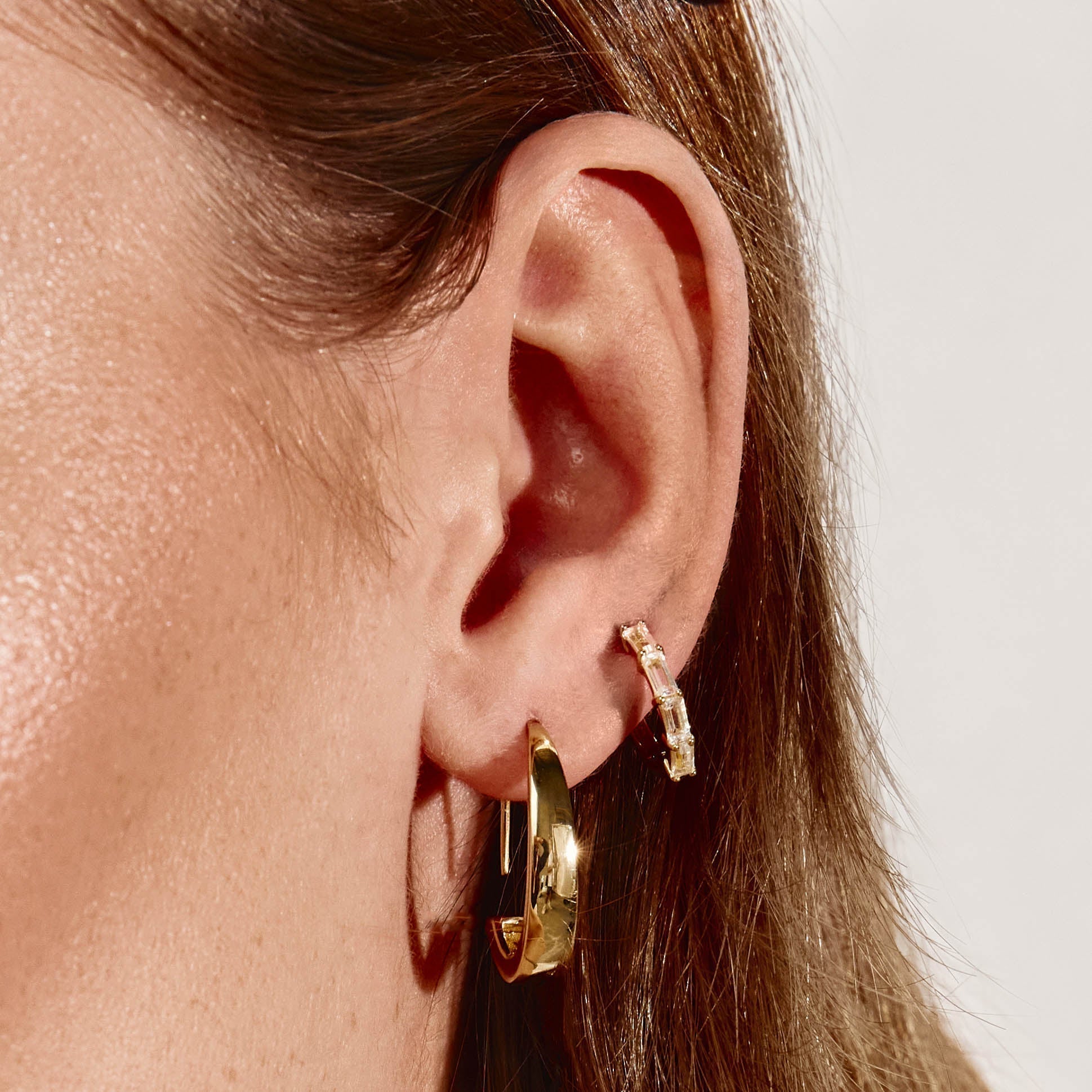 1.0 TCW Baguette Lab Grown Diamond Huggie Earrings in Gold 2